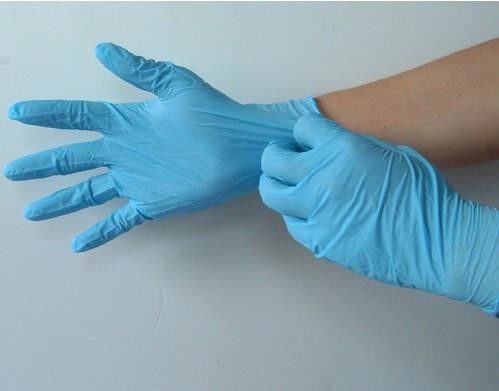 Les gants jetables de main de nitriles bleus en gros entassent en vrac en ligne près de moi fournisseur